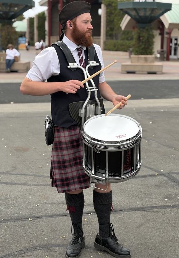 A snare drummer warming up